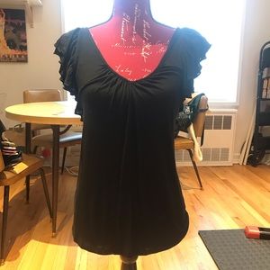 Black cap sleeve, low v-neck shirt